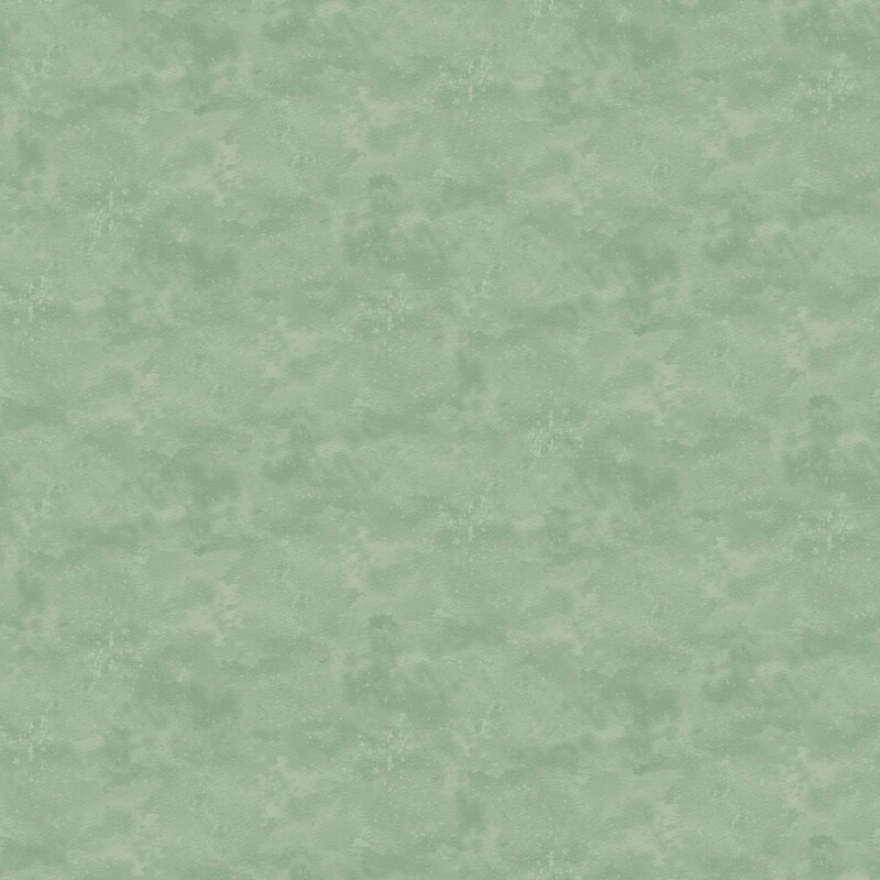 Muted teal green mottled fabric