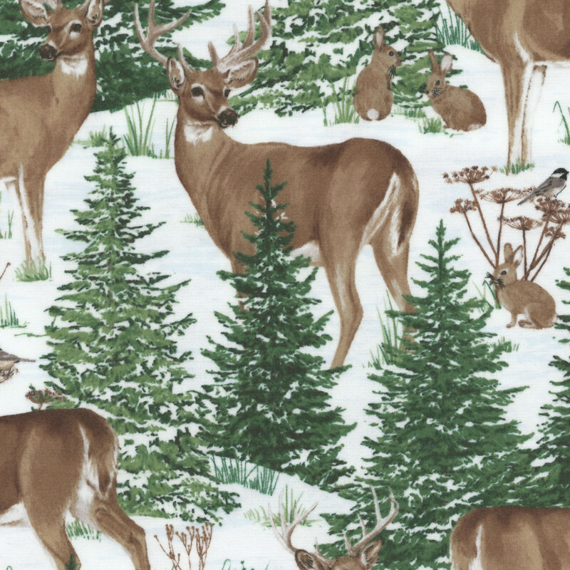 White flannel with a snow, deer, and pine pattern