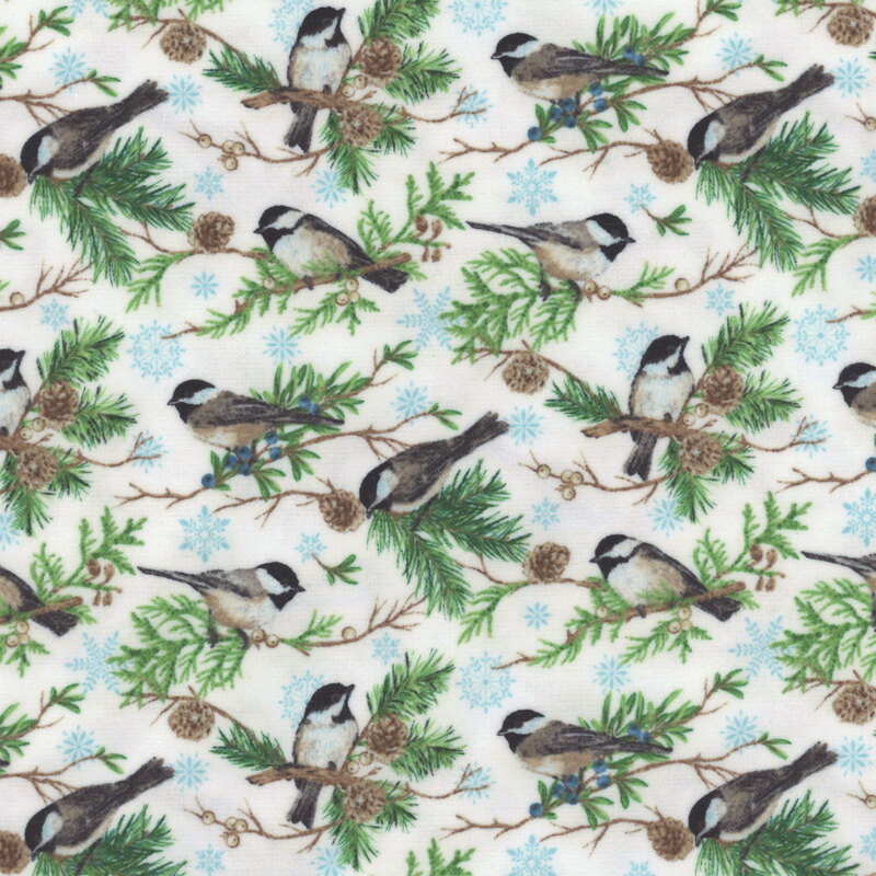 White flannel fabric with a pine, snowflake, and bird pattern