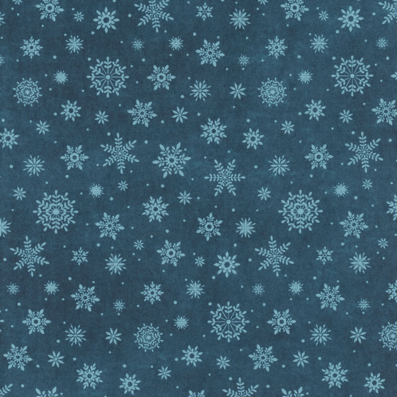 Blue mottled flannel with a tonal snowflake pattern