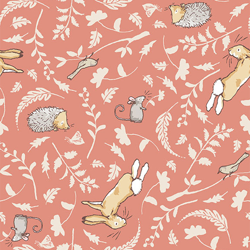 Coral fabric featuring tonal leaf silhouettes and joyful woodland animals in soft, neutral colors.