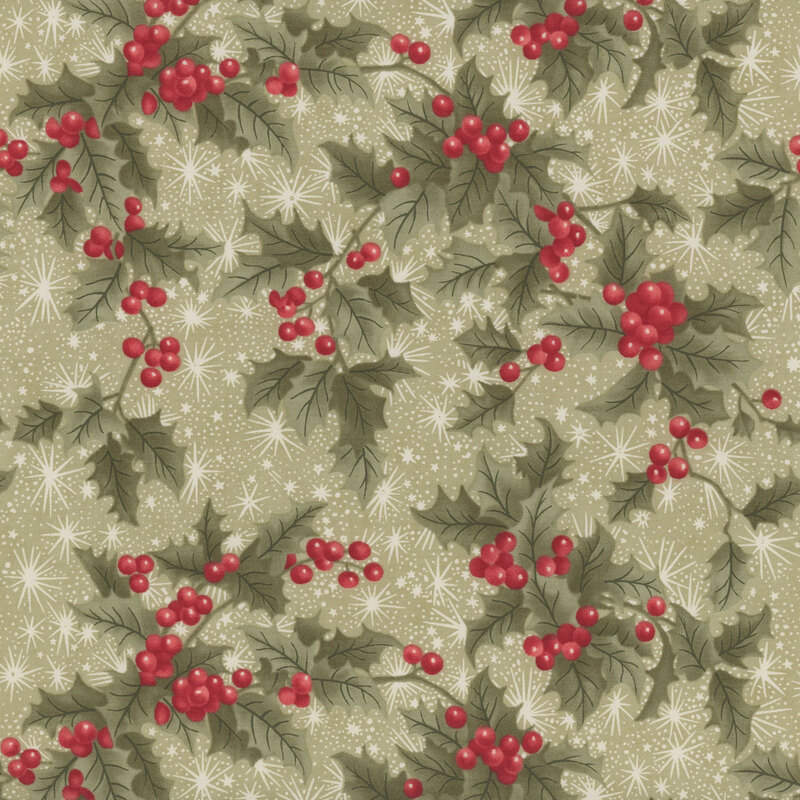 This green fabric features subtle white snowflakes amid green holly branches with vivid red berries.