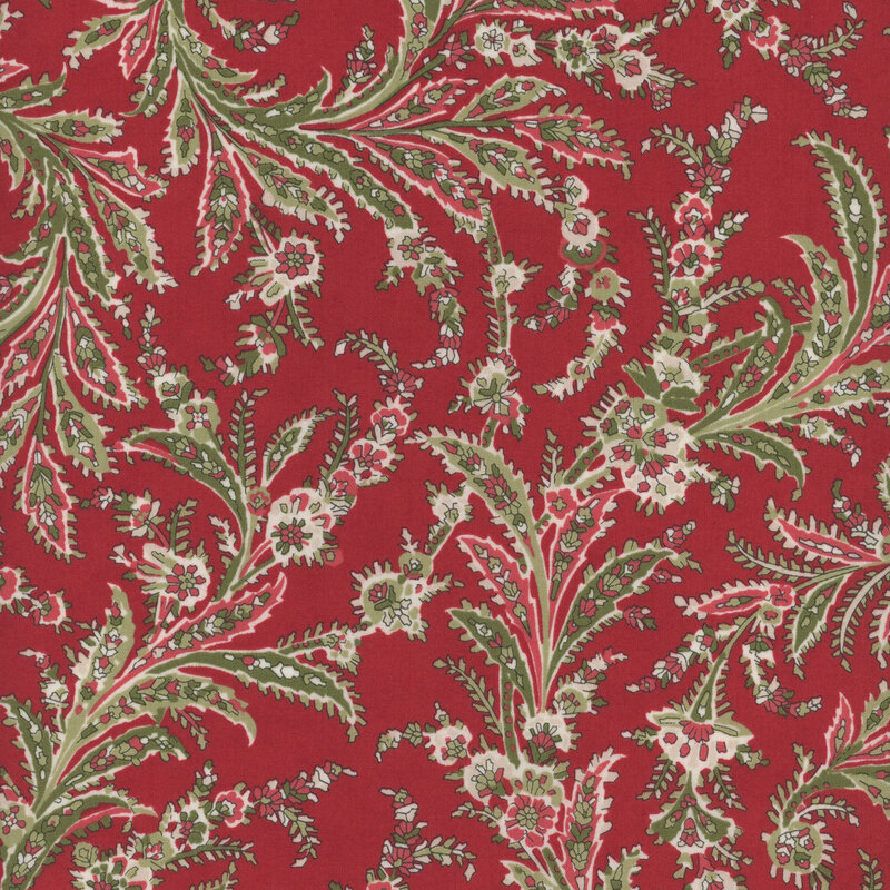 This red fabric features a unique design that vines gracefully, featuring paisley motifs in cream, green and red.