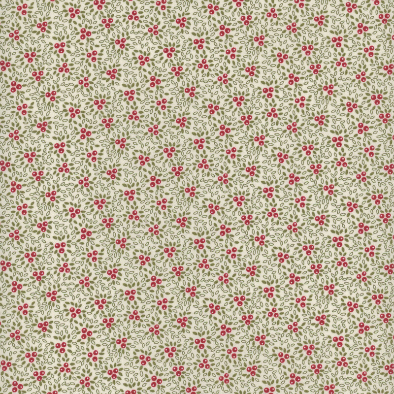 This cream fabric features clusters of red berries on a scattered background of tiny green leaves for a textured effect