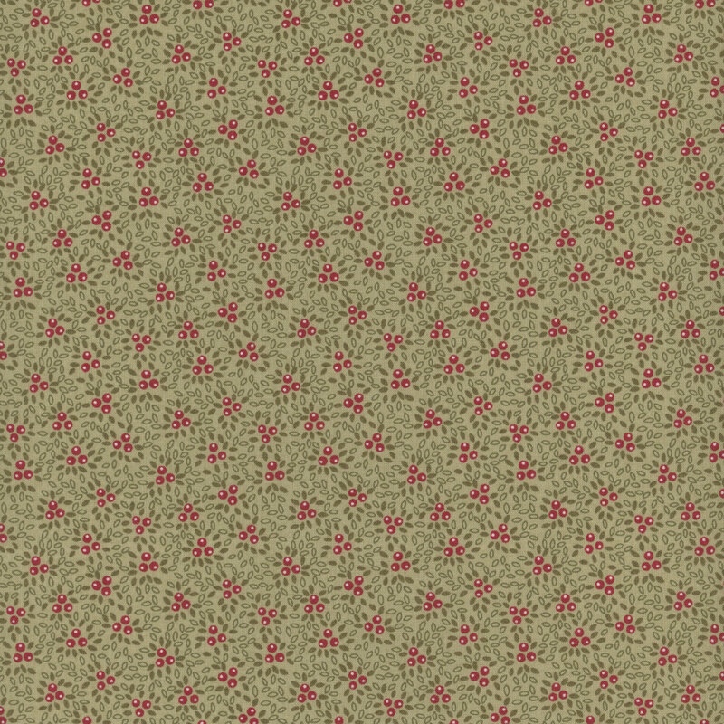 This green fabric features clusters of red berries on a scattered background of tiny green leaves for a textured effect