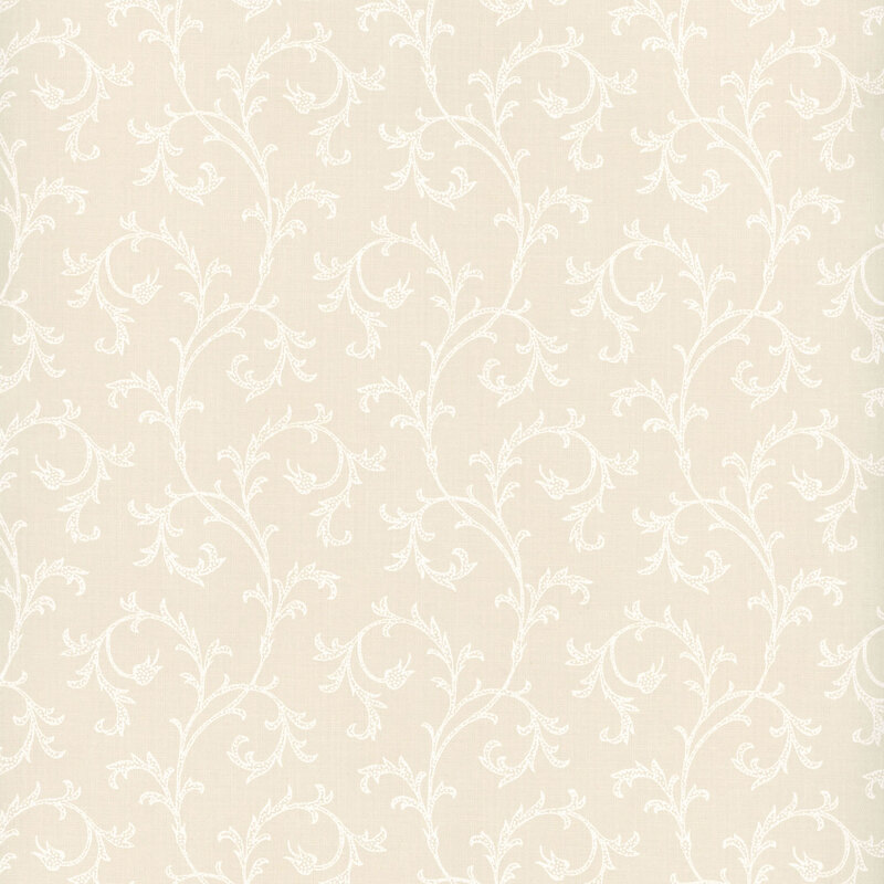 This fabric features elegant white filigree that curls across a cream background