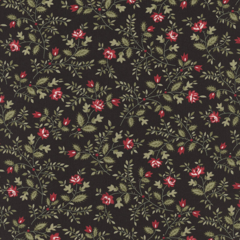 The red roses of this black fabric swirl alongside leafy green vines all over.