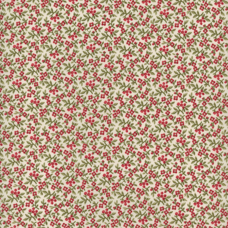 This fabric features small red flowers and green leaves crowded on a cream background