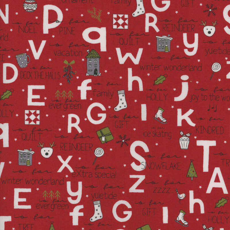 Red fabric with large white letters and handwritten Christmas themed words and illustrations.