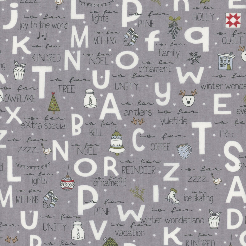 Gray fabric with large white letters and handwritten Christmas themed words and illustrations.