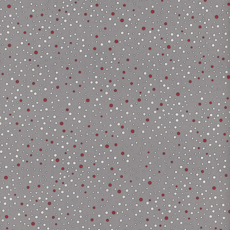 Red and white dots ranging in size and scattered across gray fabric.