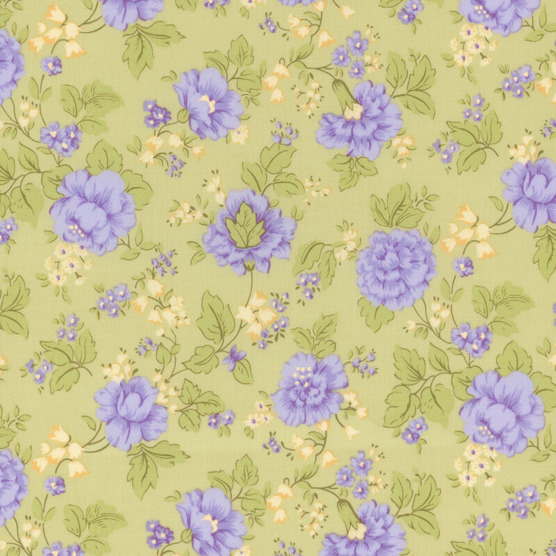 soft green fabric with scattered purple and yellow florals