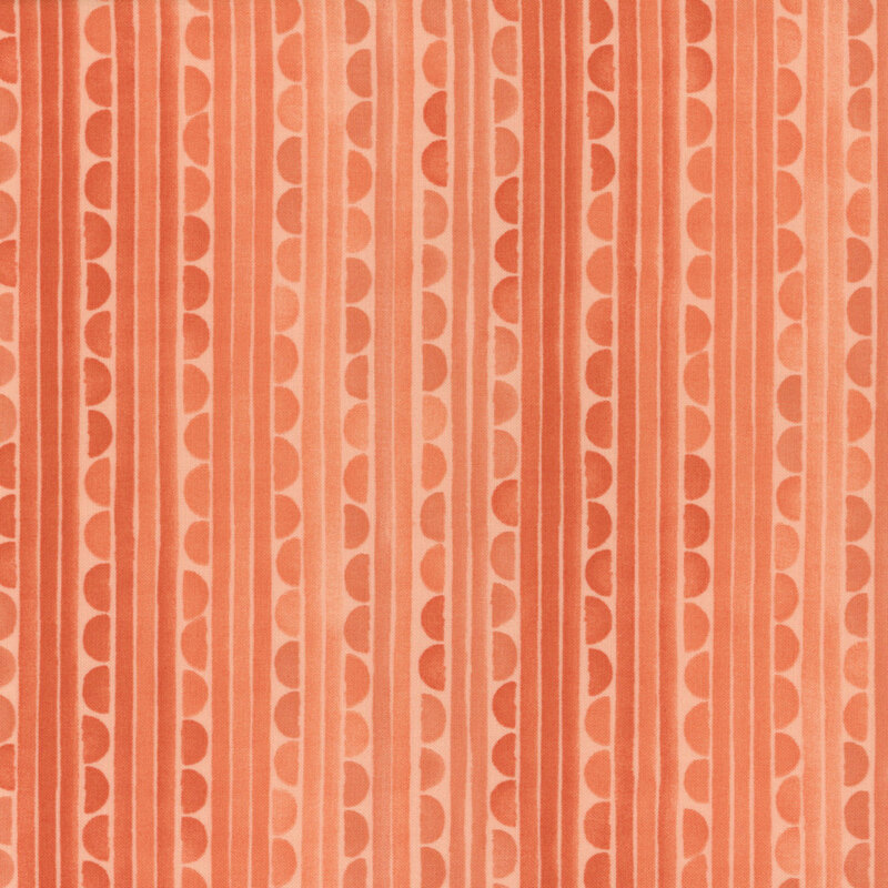 Coral tonal fabric featuring a striped pattern unique in its watercolor and scalloped details