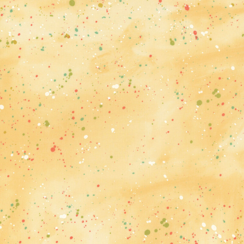 This yellow mottled fabric features multicolored splatters all over