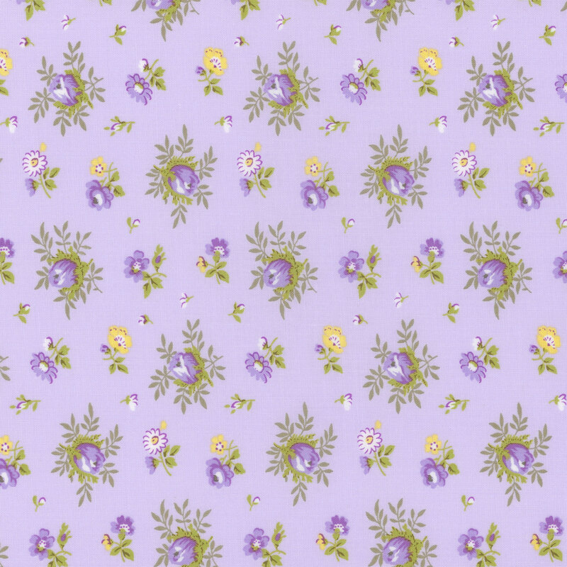 lavender fabric with scattered medium and small purple and yellow florals