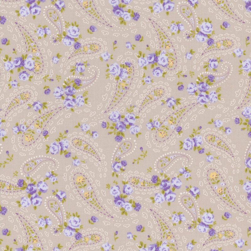 taupe fabric with scattered intricate off white paisley motifs, amidst small light purple and yellow florals