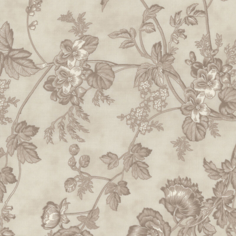 Delicate floral motifs on cream and gray tonal fabric