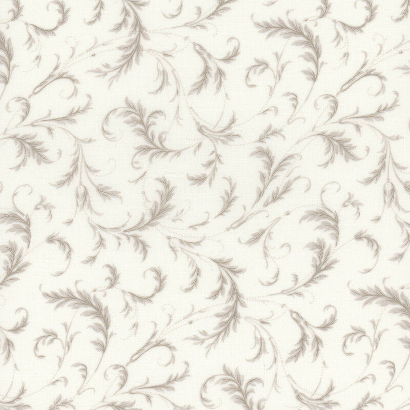 This cream fabric features gray feathery vines that curve in a delicate filigree design
