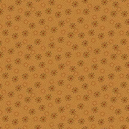 golden yellow fabric featuring stars and dots