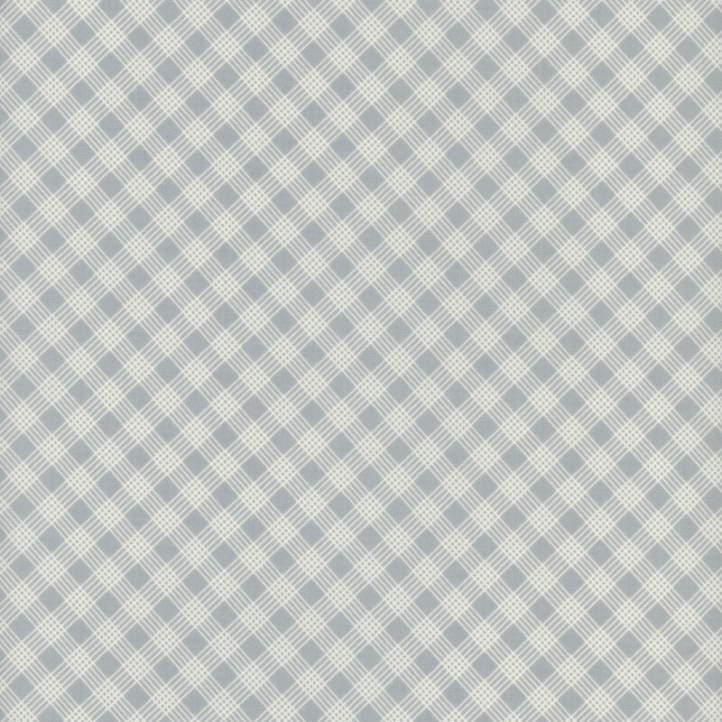 dusty blue fabric with a five line off white lattice design