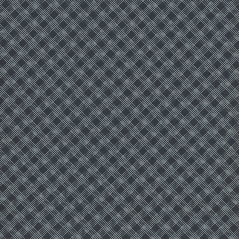 navy blue fabric with a five line dusty blue lattice design