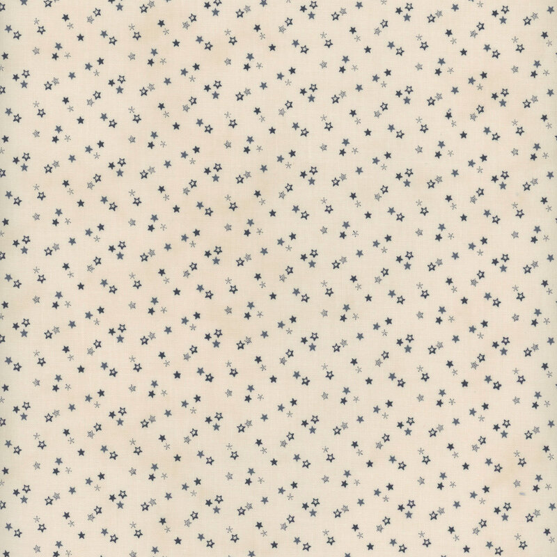 off white fabric with scattered navy and dusty blue stars