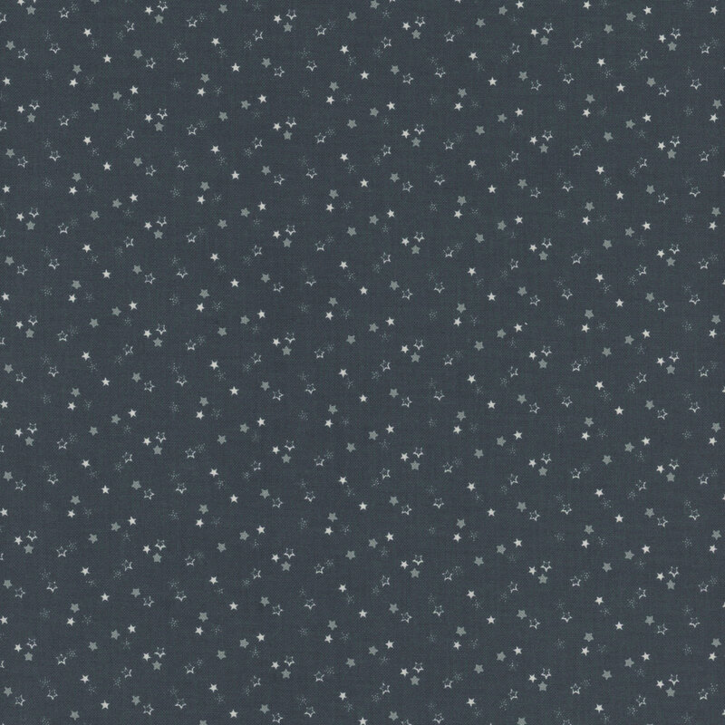 mottled navy blue fabric with scattered dusty blue and white stars