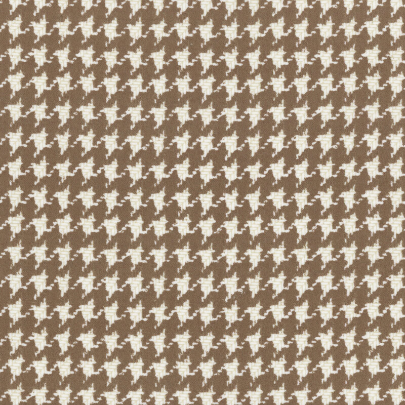 cream flannel fabric with a large brown houndstooth pattern
