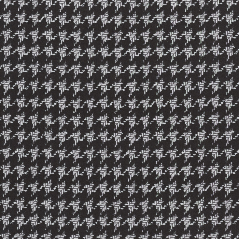 light gray flannel fabric, with a large charcoal houndstooth pattern