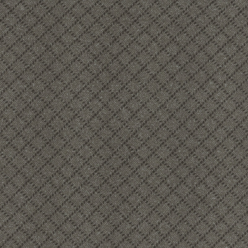 cool dark gray flannel fabric featuring small tonal dashes making a lattice design