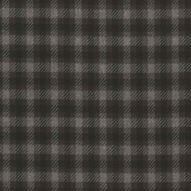 dark gray flannel fabric featuring gray and black dashed plaid striping