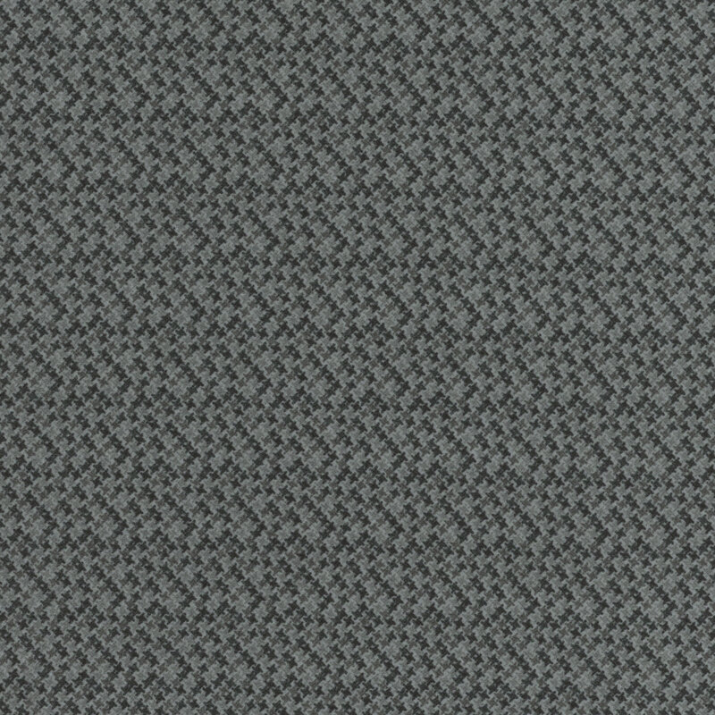 gray flannel fabric featuring packed together tonal gray 4-pointed stars