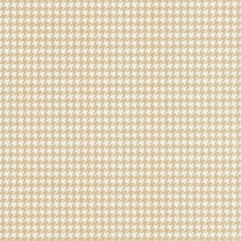 cream flannel fabric featuring a small soft tan houndstooth pattern