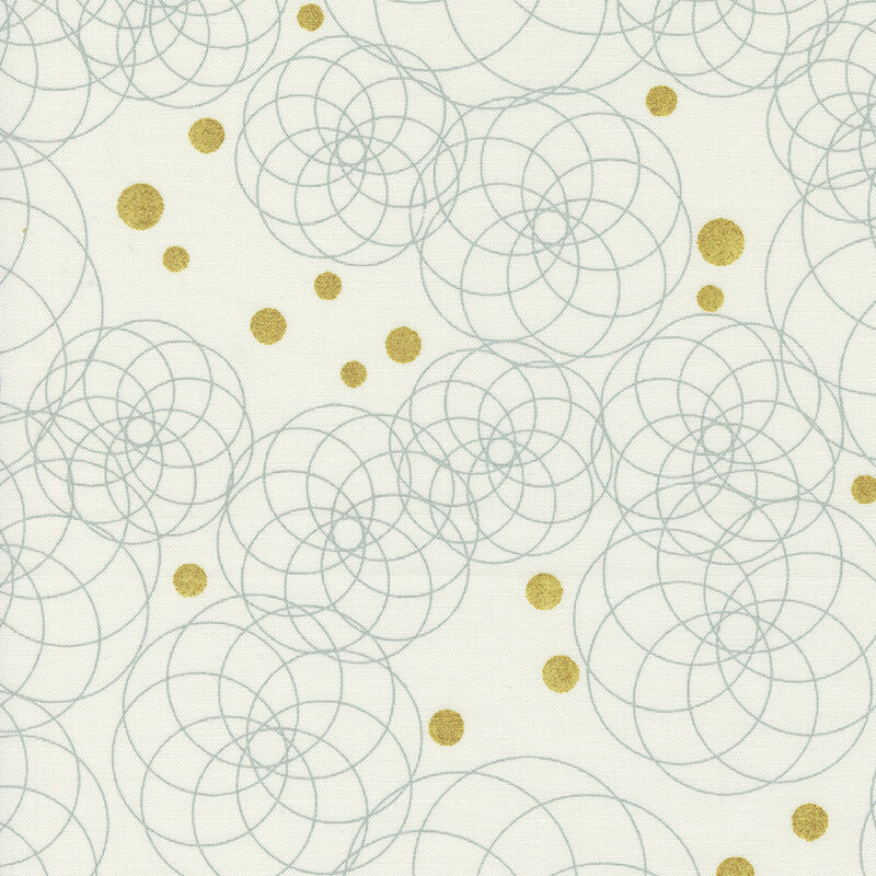 This fabric features beautiful circular fractal patterns interspersed among gold metallic dots on a cream background
