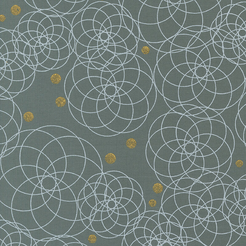 This fabric features beautiful circular fractal patterns interspersed among gold metallic dots on a dark gray background