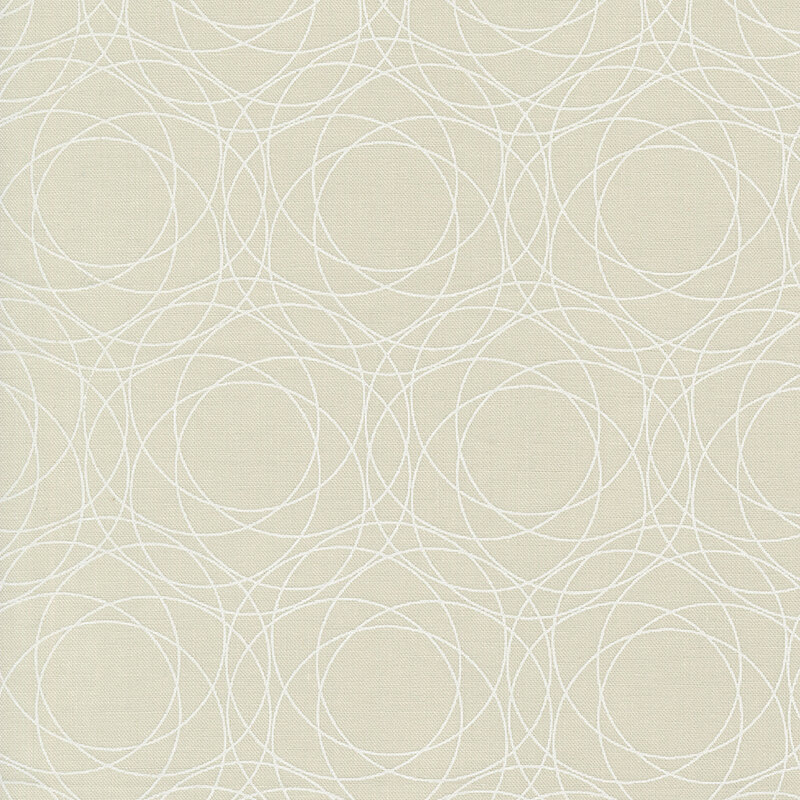 Tonal fabric featuring understated tonal fractal patterns on an ecru background