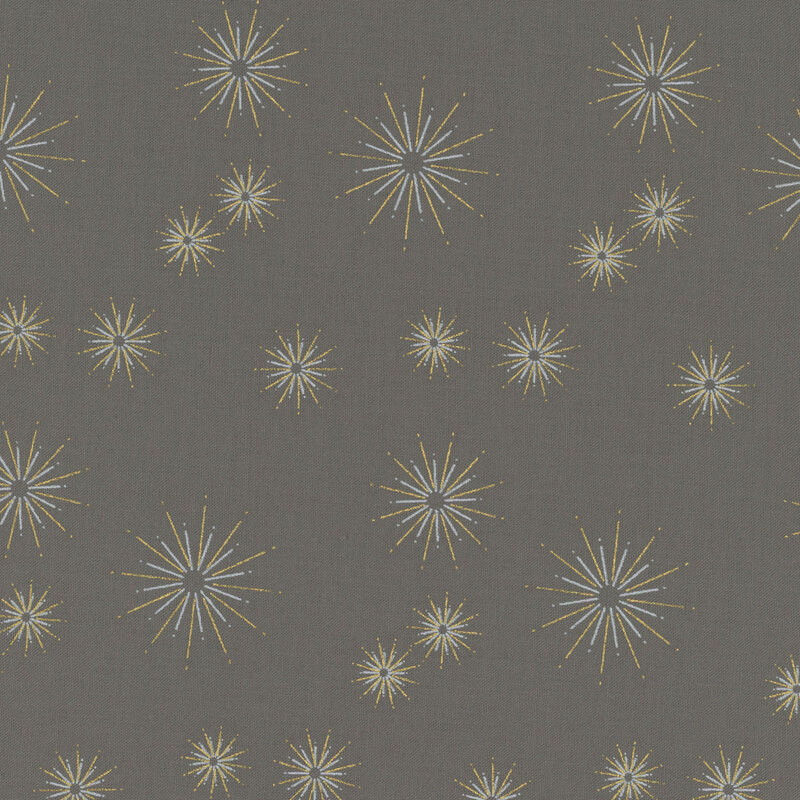 Dark gray fabric featuring gold metallic starbursts in varying sizes dotted all over.