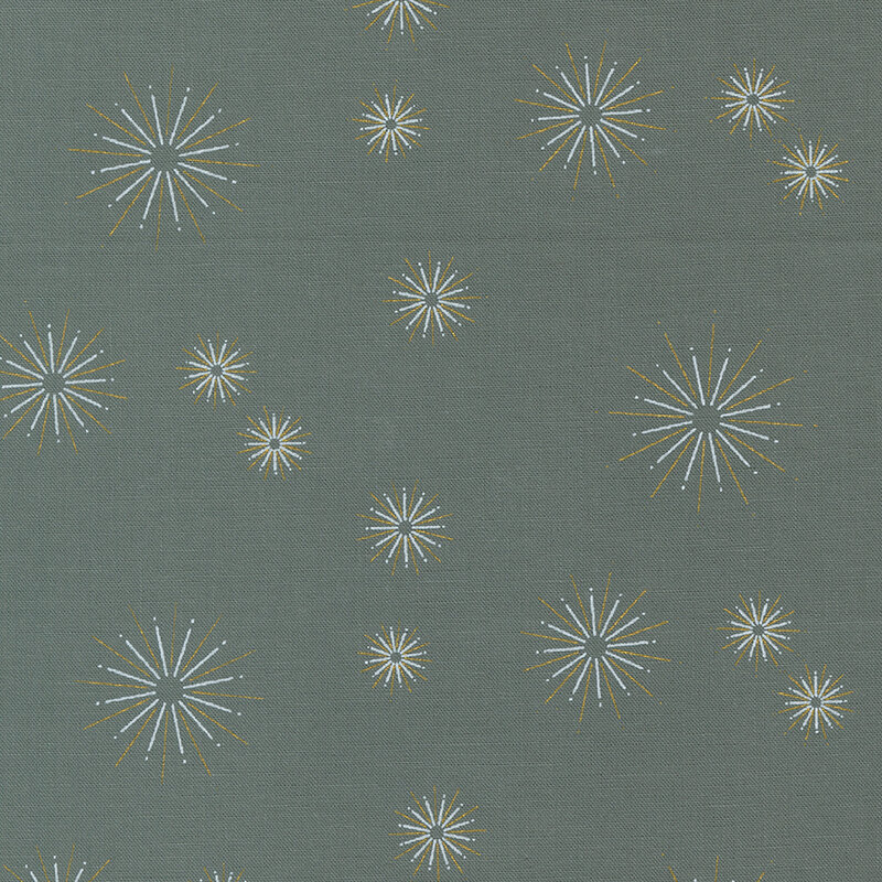 This dark gray fabric features gold metallic starbursts in varying sizes dotted all over.