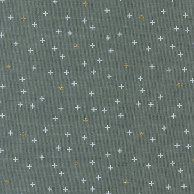 Simple dark gray fabric featuring tiny white and gold metallic crosses all over.