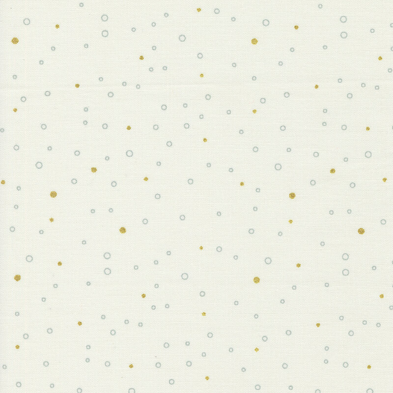 Cream fabric featuring tiny gray circles and gold metallic dots scattered all over.