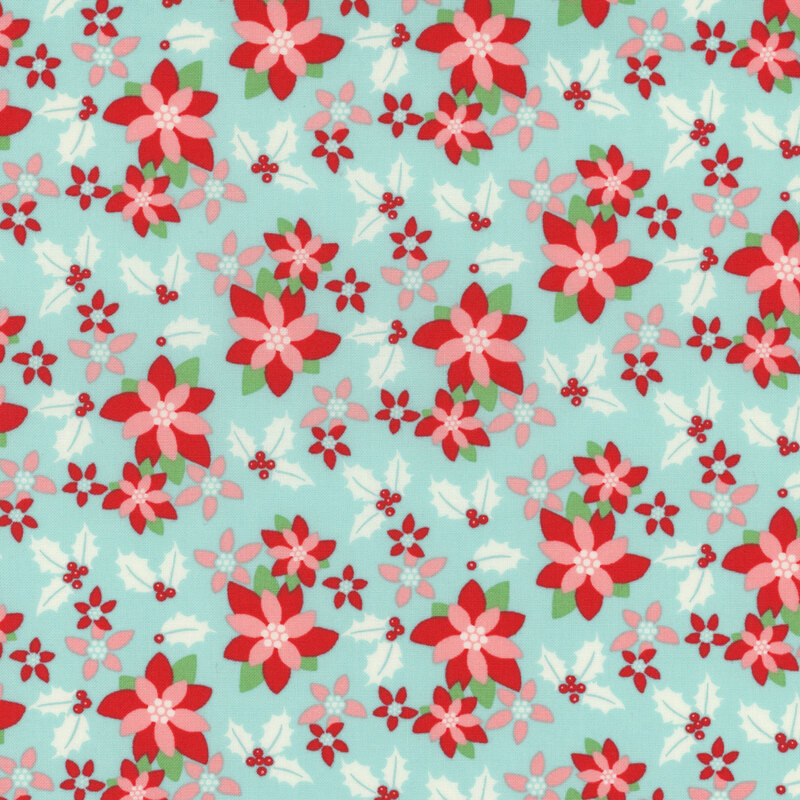 icy blue fabric featuring scattered pink and red poinsettias and bunches of red berried holly with white leaves