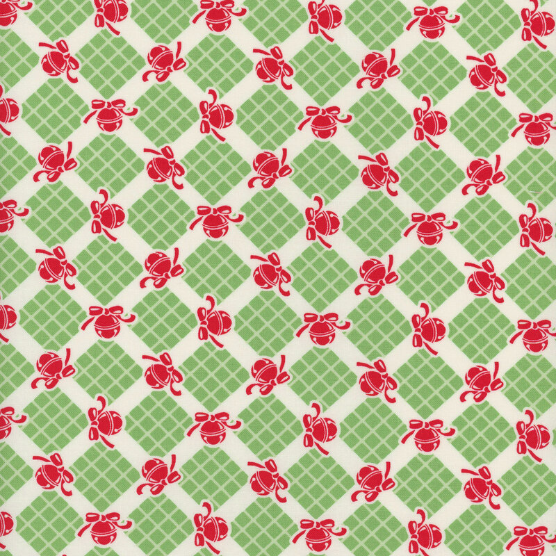 off white fabric featuring leaf green geometric elements with candy red bells scattered in between