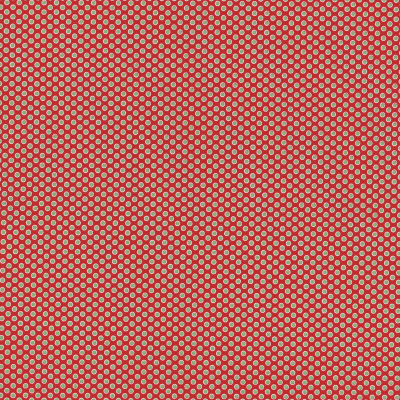 candy red fabric featuring leaf green polka dots with an off white outline