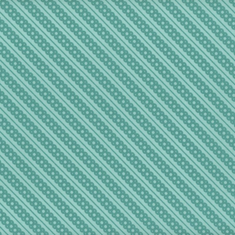 icy blue fabric featuring teal diagonal scalloped lace stripes and thin striping accents