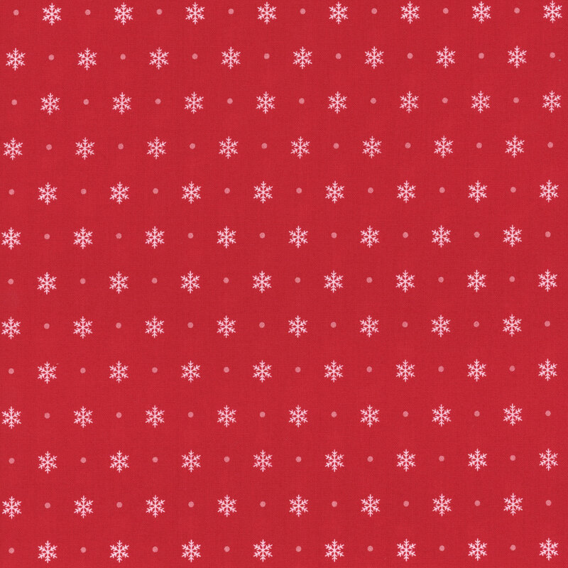 candy red fabric featuring alternating off white snowflakes and pink polka dots