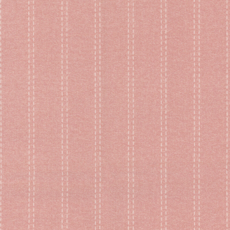 This soft coral fabric features white pin stripes in a dashed pattern that seems to mimic sewn stitches.