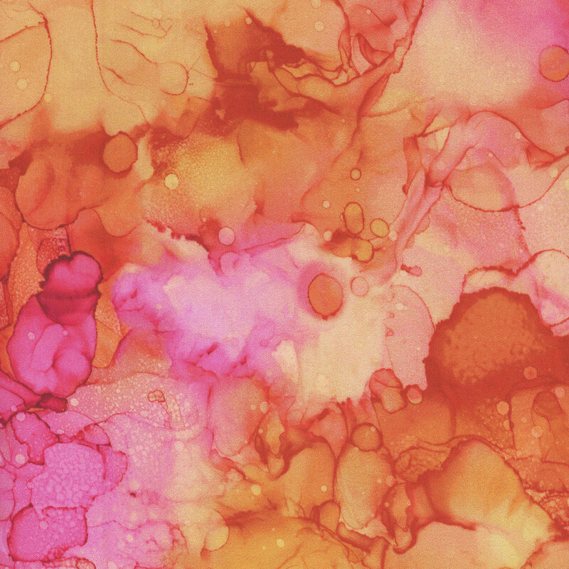 A watercolor print in shades of orange and yellow with a splash of pink.