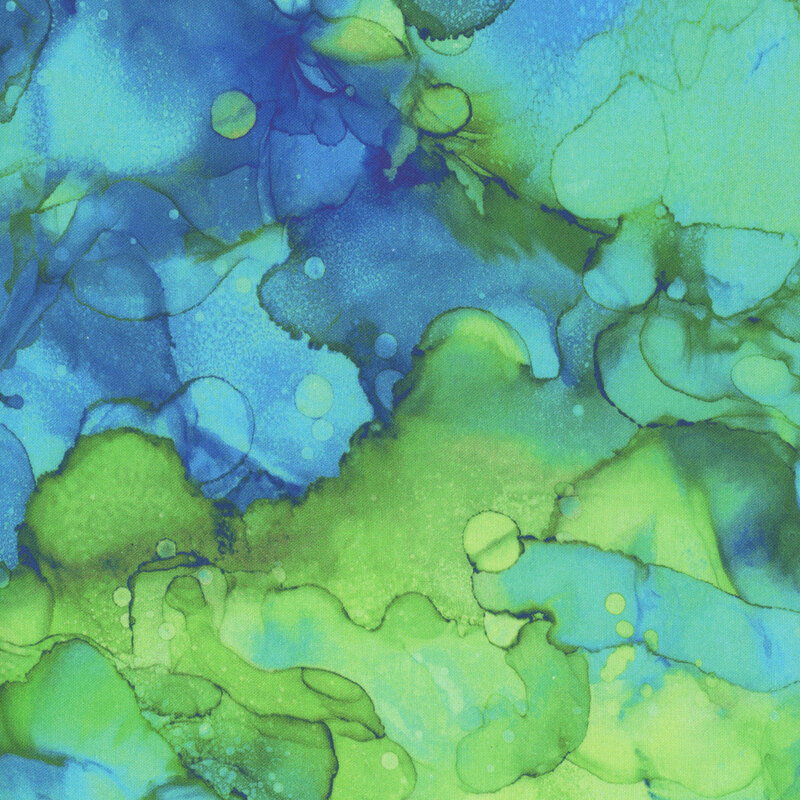 A watercolor print in shades of aqua, green, and blue with a splash of yellow.