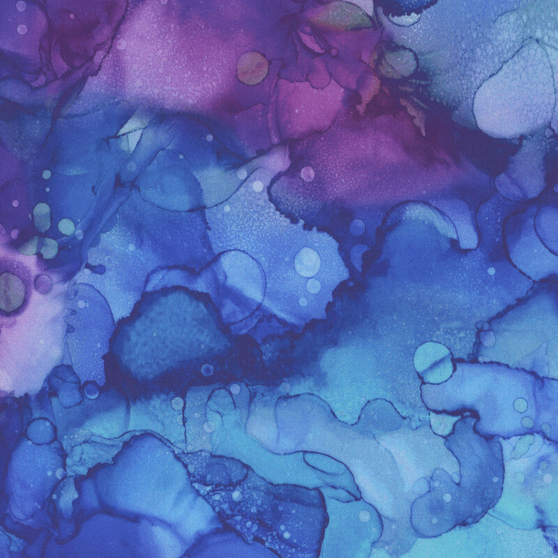 A watercolor print in shades of purple and blue with a splash of teal.