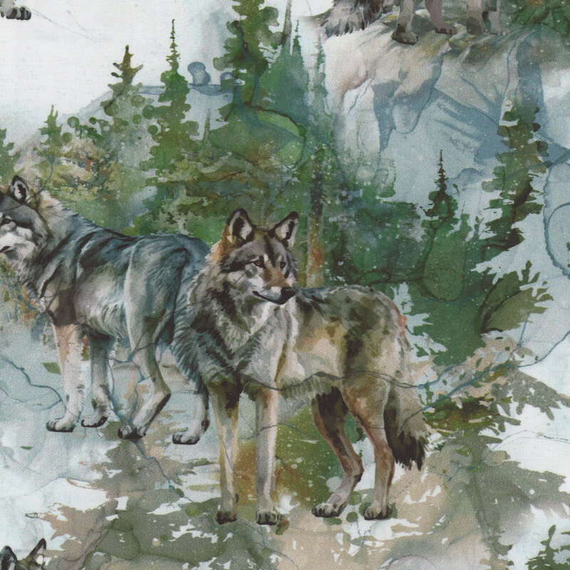 gorgeous fabric featuring scattered wolves over a faded pine forest, all done in a lovely watercolor style